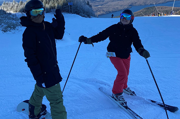 Two people skiing on top of Mount Tremblant.